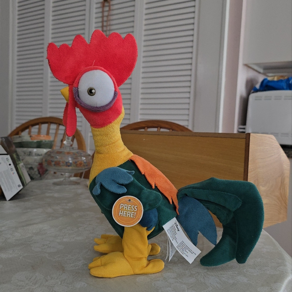 Disney Moana Hei Hei clucking and  dancing rooster